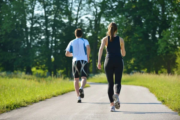 Casal jogging — Fotografia de Stock