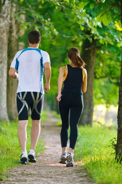 Paar joggen — Stockfoto