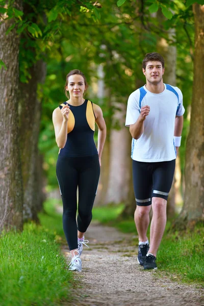 Paar joggen — Stockfoto