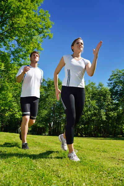 Paar joggen — Stockfoto