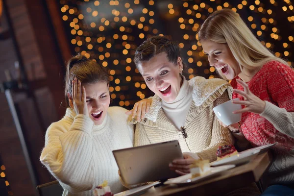 Happy girls group looking at a pc tablet — Stock Photo, Image