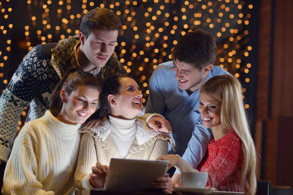 Happy looking at a tablet computer — Stock Photo, Image