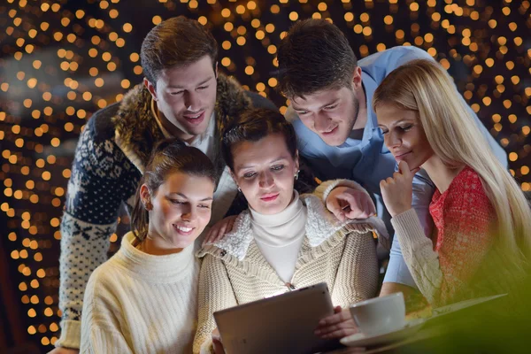 Happy looking at a tablet computer — Stock Photo, Image