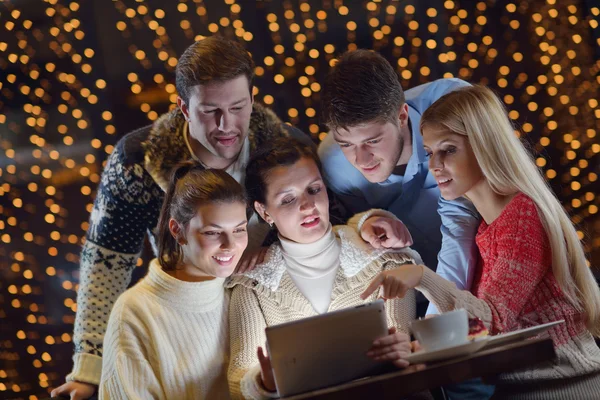 Happy looking at a tablet computer — Stock Photo, Image