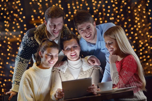 Happy looking at a tablet computer — Stock Photo, Image