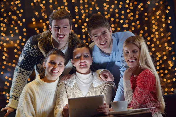 Happy looking at a tablet computer — Stock Photo, Image