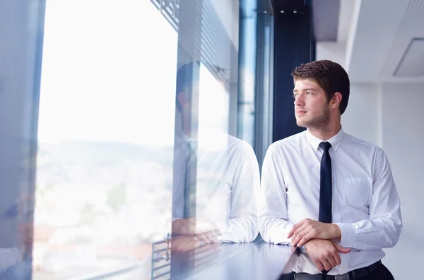 Happy young business man at office — Stock Photo, Image