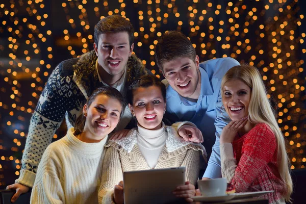 Happy looking at a tablet computer — Stock Photo, Image