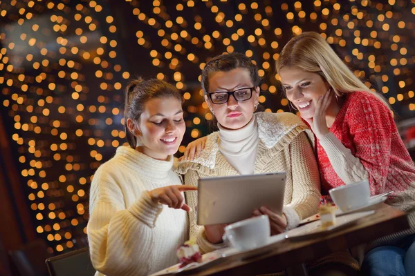 Happy girls group looking at a pc tablet — Stock Photo, Image