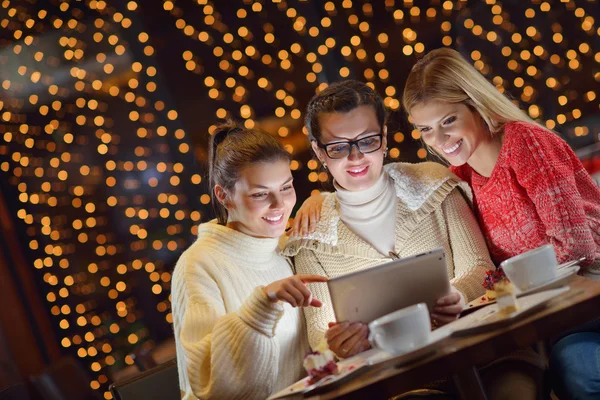 Happy girls group looking at a pc tablet — Stock Photo, Image