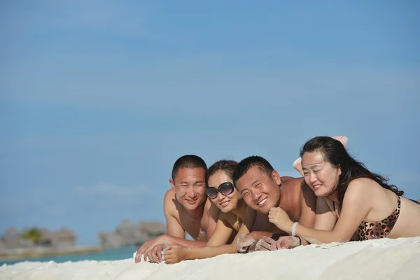 Group of happy young have fun on bach — Stock Photo, Image