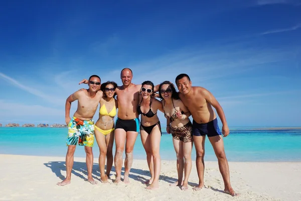 Group of happy young have fun on bach — Stock Photo, Image