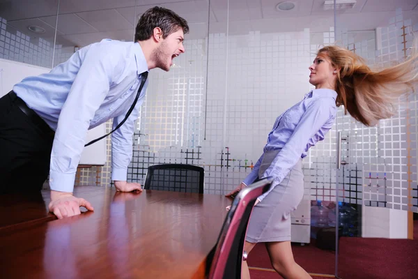 Angry busines sman screaming at employee — Stock Photo, Image