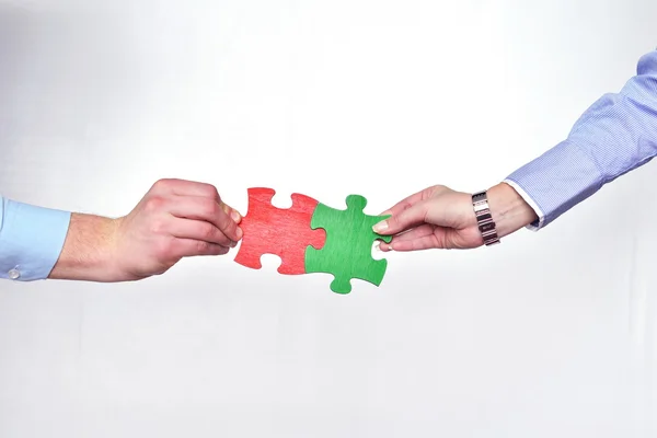 Group of business assembling jigsaw puzzle — Stock Photo, Image