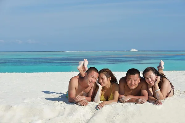 Group of happy young have fun on bach — Stock Photo, Image