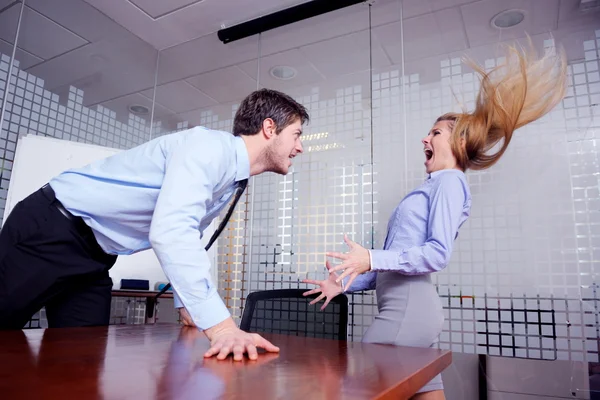 Angry busines sman screaming at employee — Stock Photo, Image