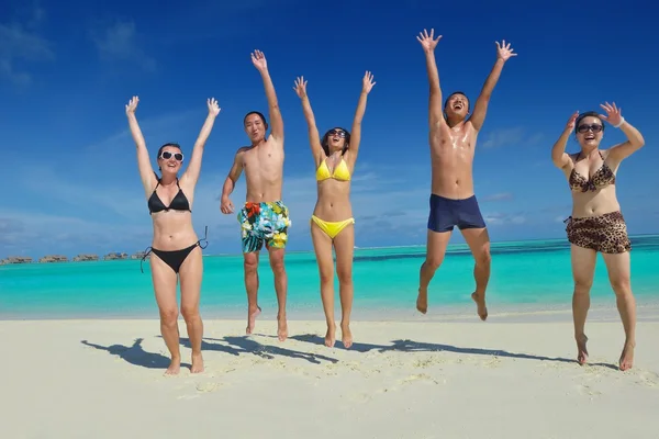 Group of happy young have fun on bach — Stock Photo, Image