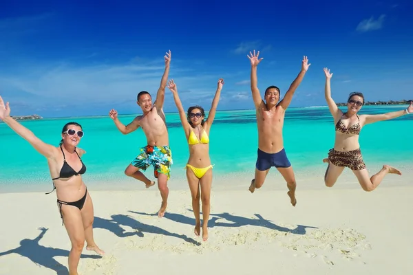 Group of happy young have fun on bach — Stock Photo, Image