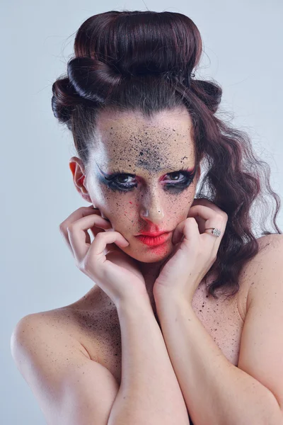 Vacker kvinna med lyxiga makeup — Stockfoto
