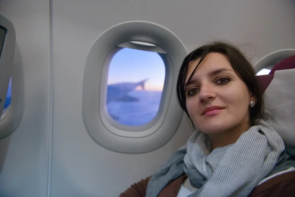 Woman in airplane travel — Stock Photo, Image