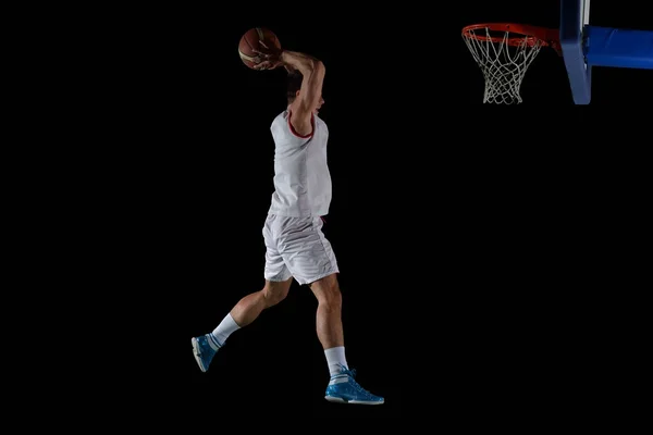 Баскетболист в действии — стоковое фото
