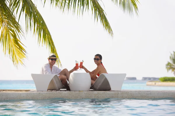 Happy young couple relax and take fresh drink — Stock Photo, Image