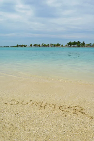 Summer written on the sand — Stock Photo, Image