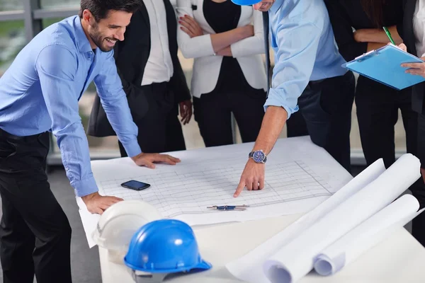 Business people and engineers on meeting — Stock Photo, Image