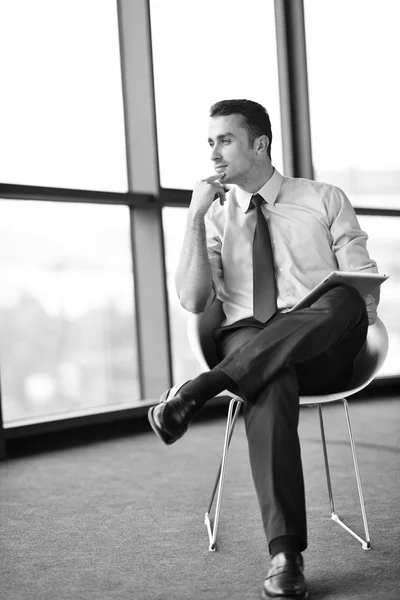 Happy young business man at office — Stock Photo, Image