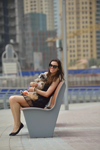 Young woman with puppy have fun — Stock Photo, Image