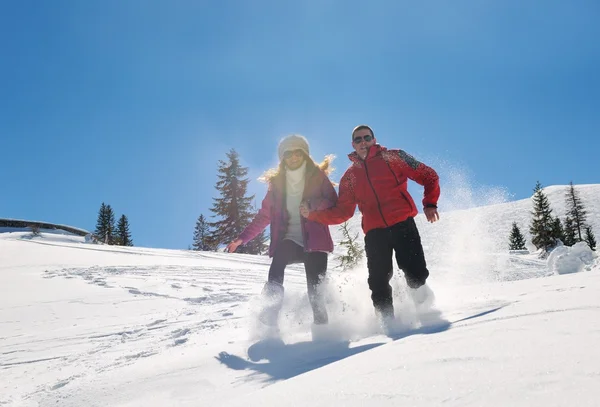 Young couple on winter vacation — Stock Photo, Image