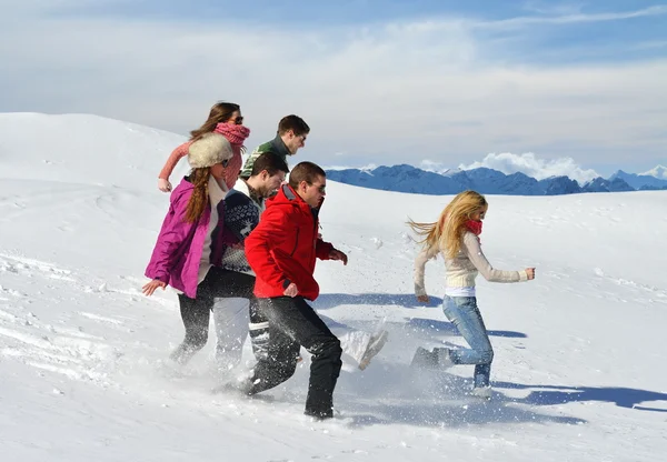 Friends have fun at winter on fresh snow — Stock Photo, Image