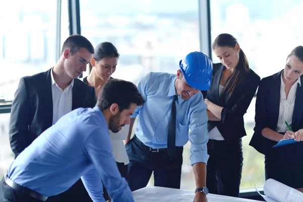 Business people and construction engineers on meeting — Stock Photo, Image