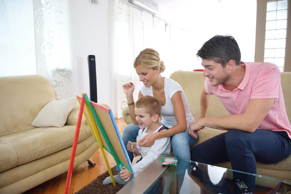 Family drawing on school board at home — Stock Photo, Image