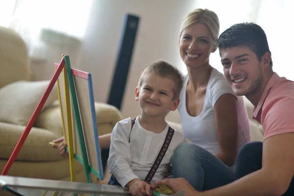 Family drawing on school board at home — Stock Photo, Image