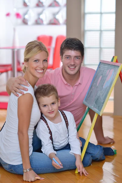 Family drawing on school board at home — 图库照片