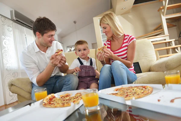 Family eating pizza Stock Picture