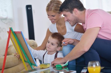 family drawing on school board at home clipart