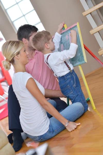 Family drawing on school board at home — Stock Photo, Image