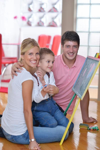 Family drawing on school board at home — Stock fotografie