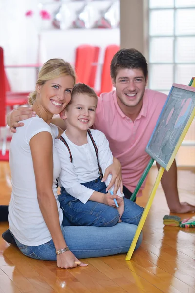 Family drawing on school board at home — Stock Photo, Image