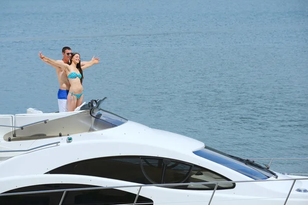 Young couple at yacht — Stock Photo, Image