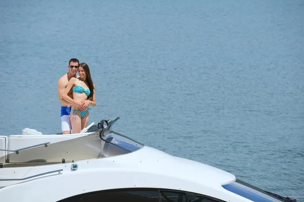 Young couple at yacht — Stock Photo, Image