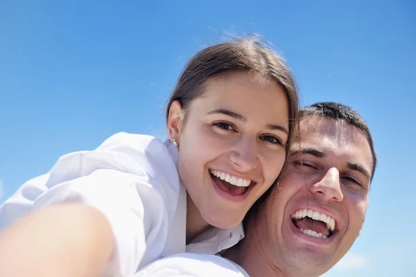 Couple have fun at the beach Stock Picture