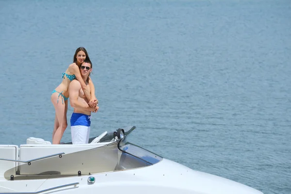 Young couple at yacht — Stock Photo, Image