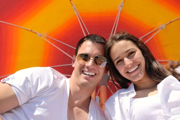 Couple under umbrella — Stock Photo, Image