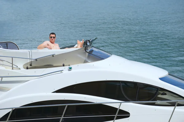 Young man on yacht — Stock Photo, Image