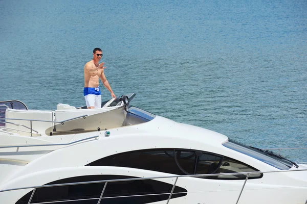 Young man on yacht — Stock Photo, Image