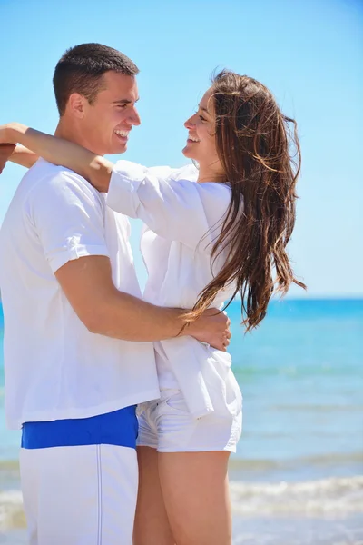 Par på stranden — Stockfoto