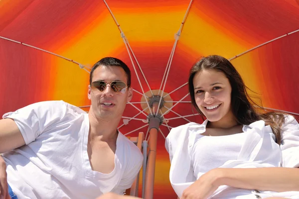 Couple under umbrella — Stock Photo, Image